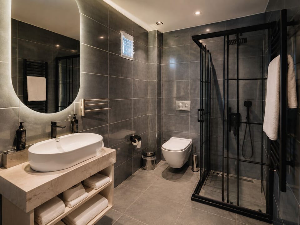 Hair dryer, towels, soap, shampoo