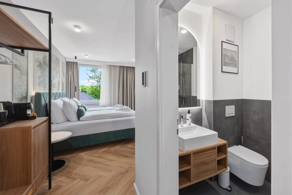Deluxe Double Room, City View | Bathroom | Shower, hair dryer, slippers, towels