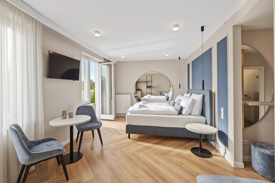Junior Studio Suite, Balcony, City View | In-room safe, desk, laptop workspace, free WiFi