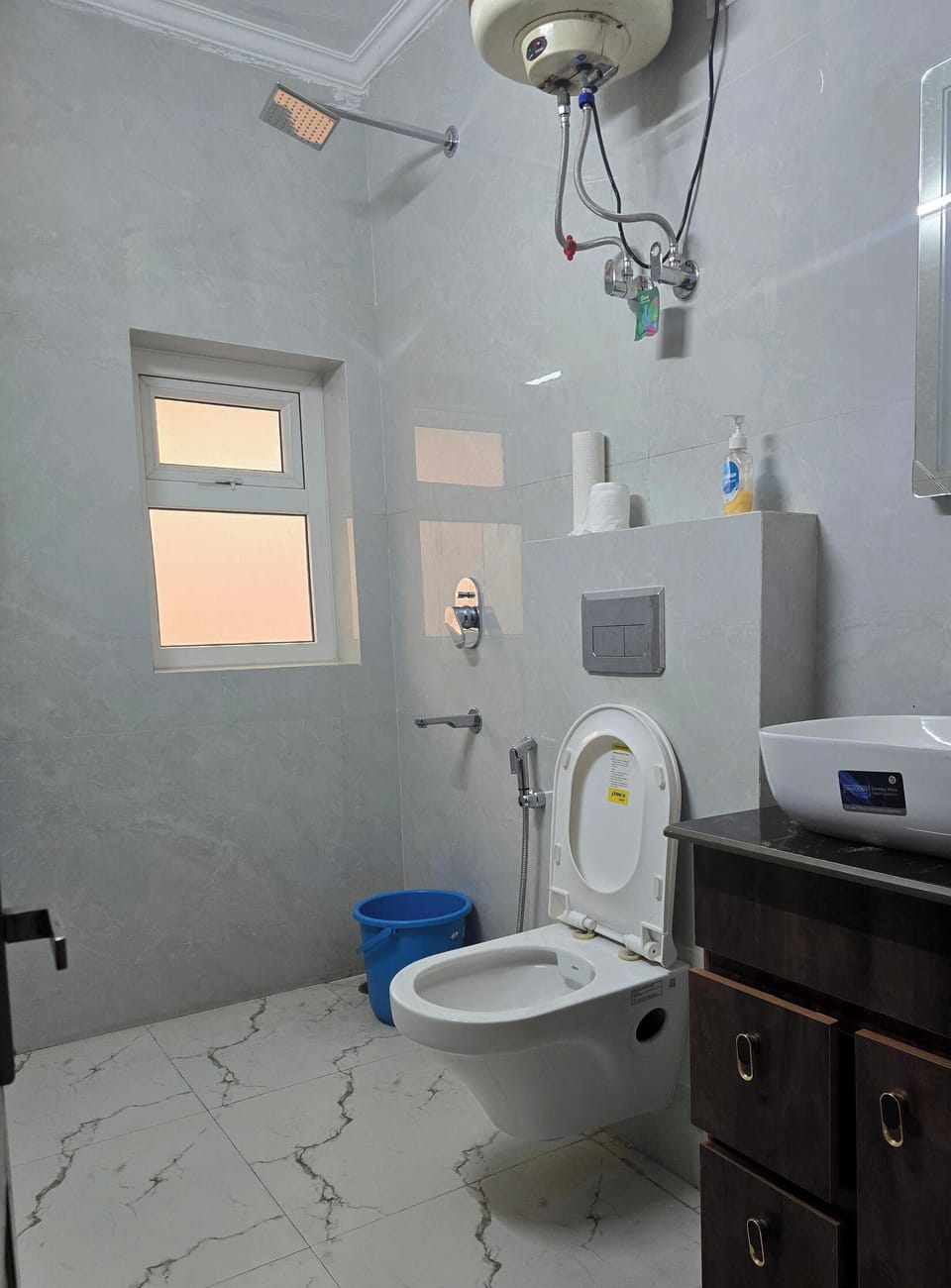 Family Studio, Garden View | Bathroom | Shower, free toiletries, hair dryer, slippers