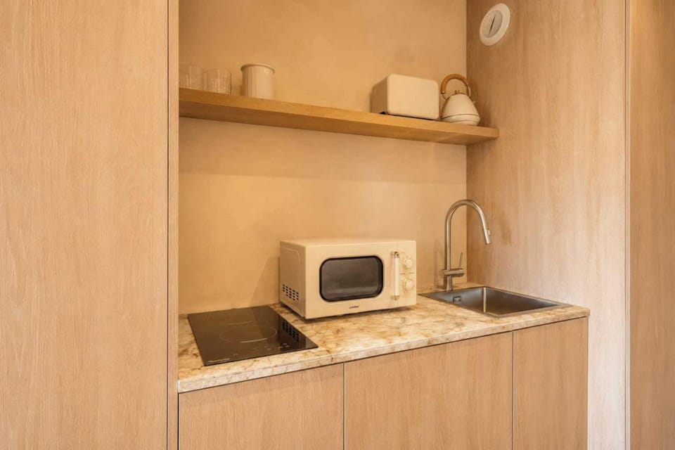 Apartment | Private kitchen | Coffee/tea maker, fridge, microwave, stovetop
