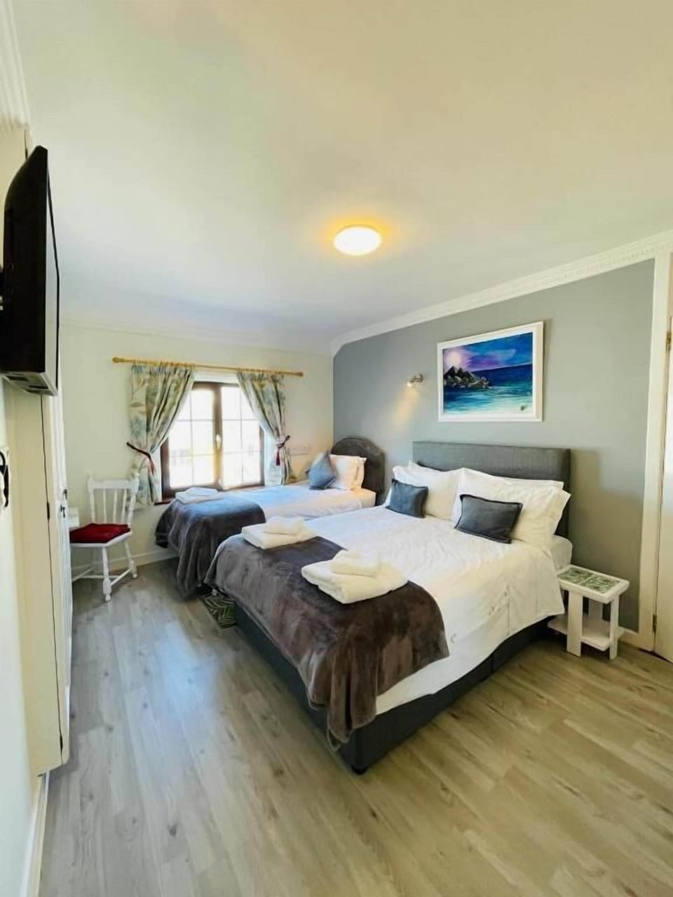 Basic Triple Room, Partial Sea View | Desk, laptop workspace, WiFi (free)