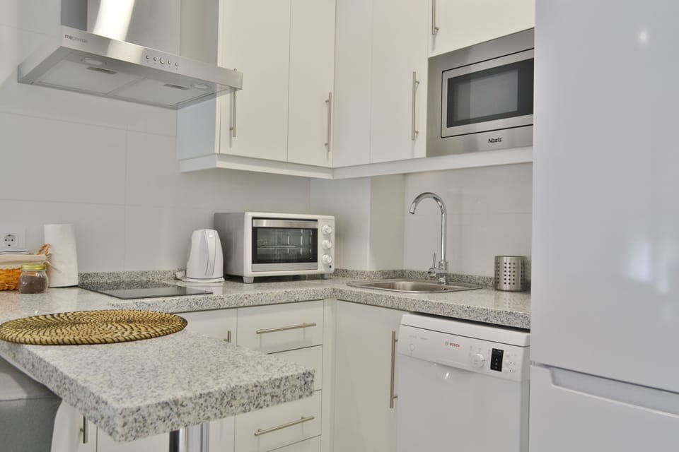 Apartment, 2 Bedrooms | Private kitchen | Fridge, microwave, stovetop, dishwasher