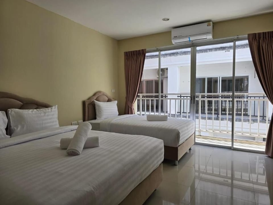 Triple Room, Balcony, City View | In-room safe, free WiFi
