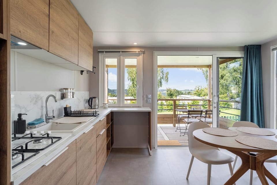Economy Chalet, 2 Bedrooms | Private kitchen | Full-size fridge, stovetop, cookware/dishes/utensils