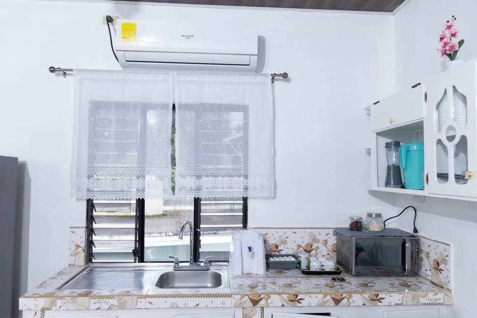 Mini-fridge, microwave, stovetop, cookware/dishes/utensils