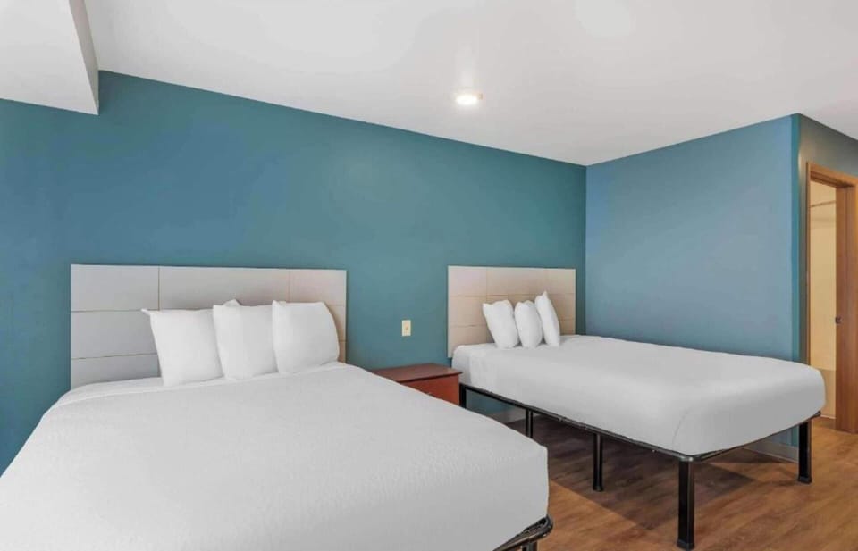 Room, 2 Queen Beds, Non Smoking (Kitchen) | Free WiFi, bed sheets