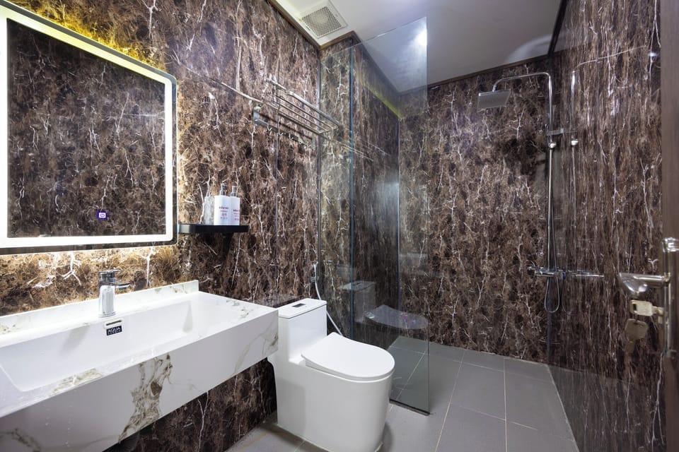 Superior Room, Balcony, Pool View | Bathroom | Shower, hair dryer, slippers, towels
