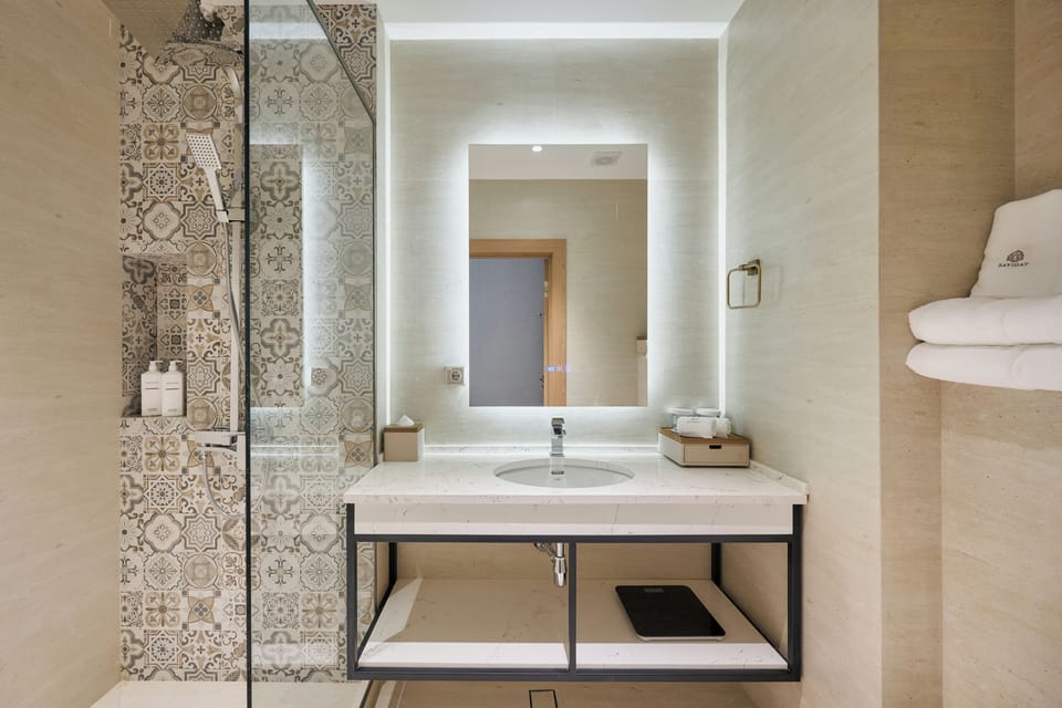 Shower, free toiletries, hair dryer, bathrobes