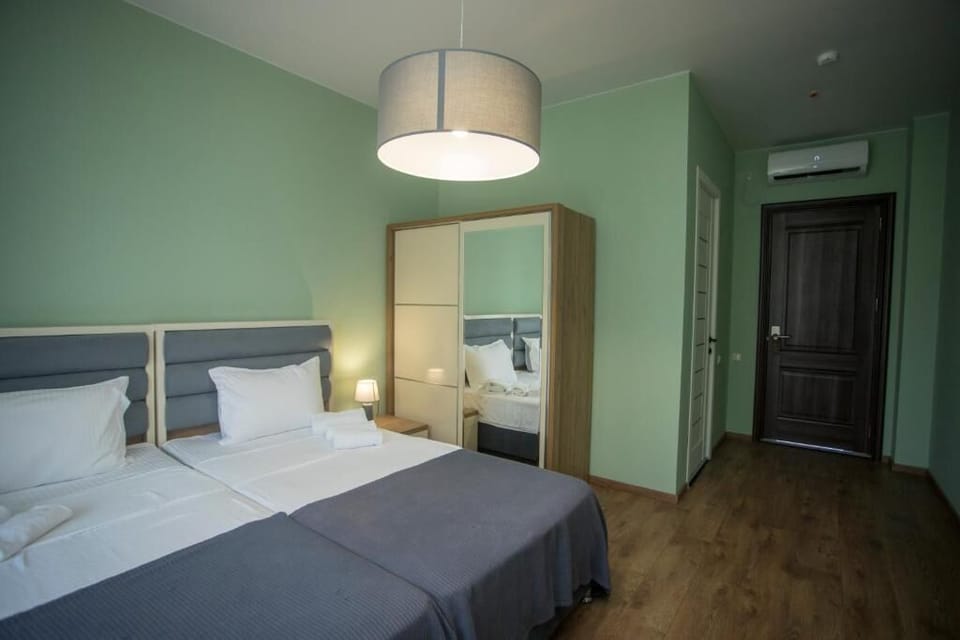 Standard Twin Room, Balcony, Sea View | In-room safe, travel crib, free WiFi, bed sheets