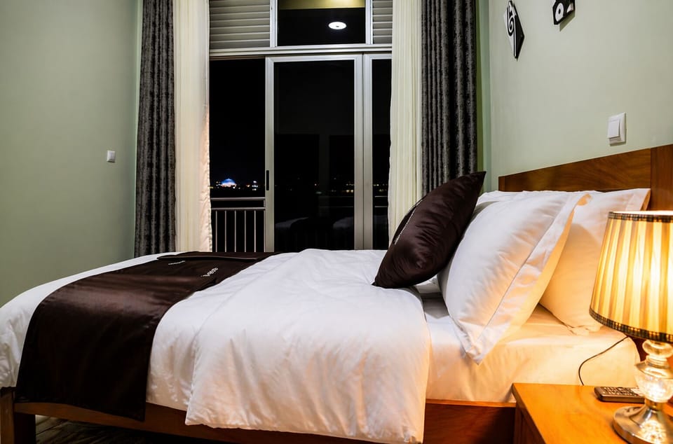 Comfort Double Room, City View | In-room safe, desk, soundproofing, iron/ironing board