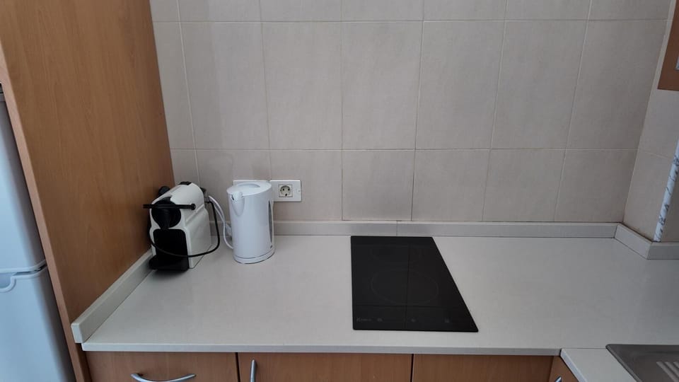 Apartment, Pool View | Private kitchen | Espresso maker, coffee/tea maker, microwave, cookware/dishes/utensils