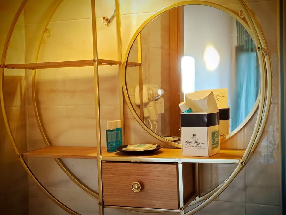 Hair dryer, bidet, towels, soap