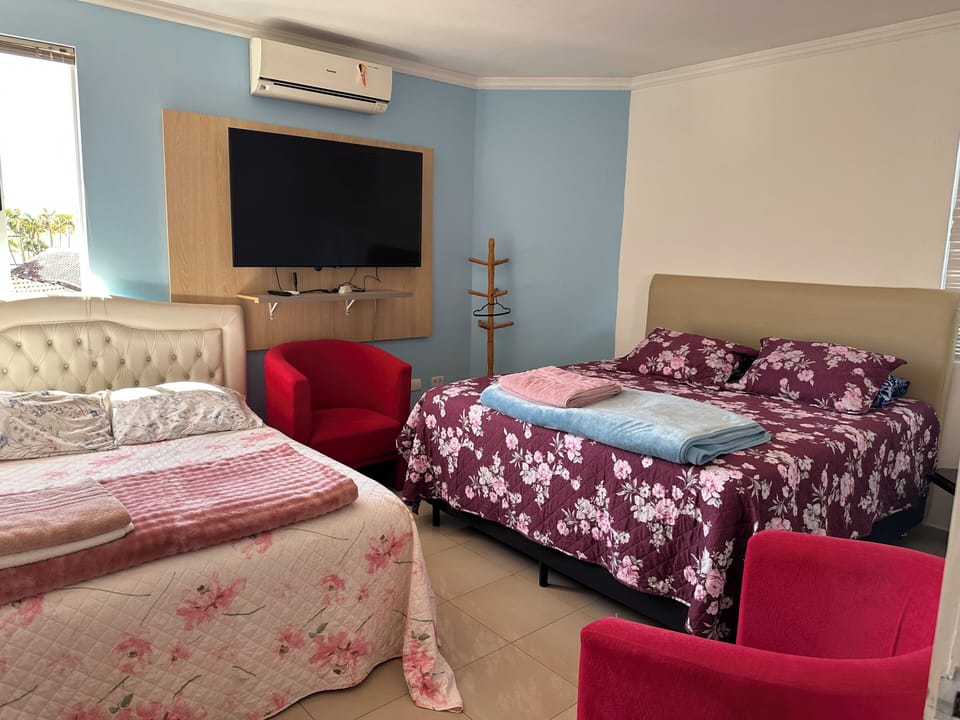 Family Double or Twin Room, Courtyard View | Blackout drapes, iron/ironing board, free WiFi