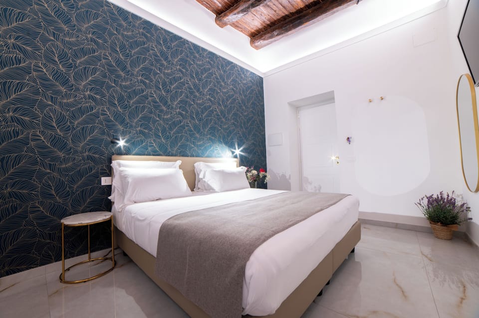 Deluxe Triple Room, City View | In-room safe, blackout drapes, iron/ironing board, free WiFi