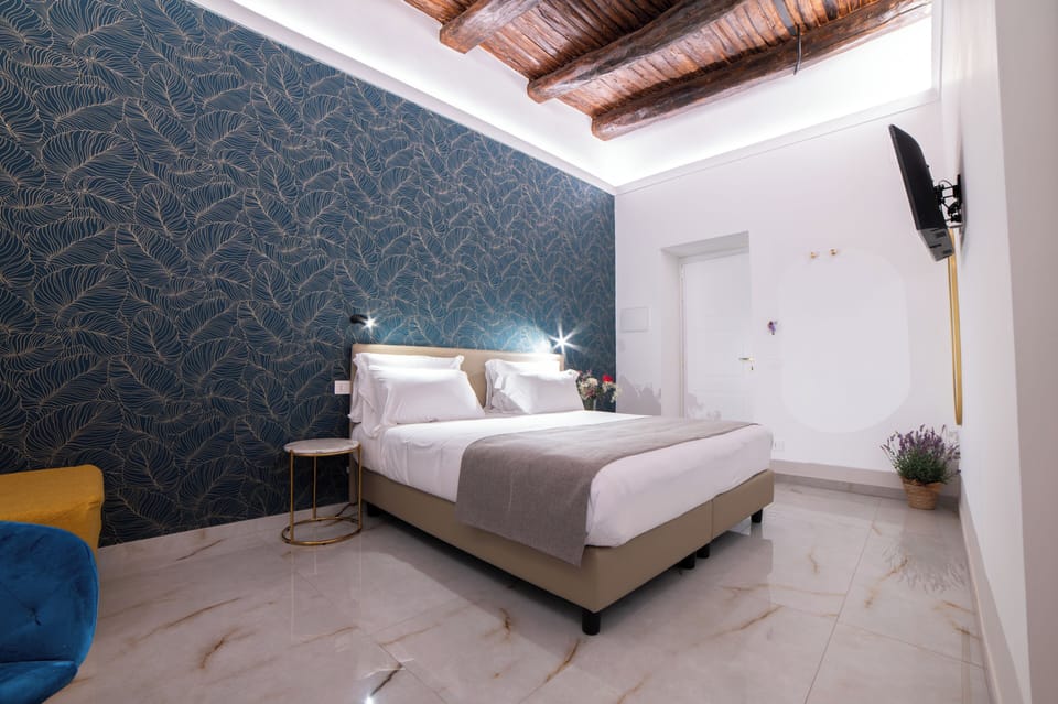 Deluxe Triple Room, City View | In-room safe, blackout drapes, iron/ironing board, free WiFi