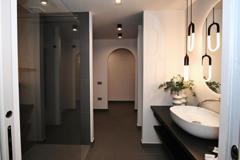Superior Double Room, Balcony, City View | Bathroom | Shower, hair dryer, slippers, towels