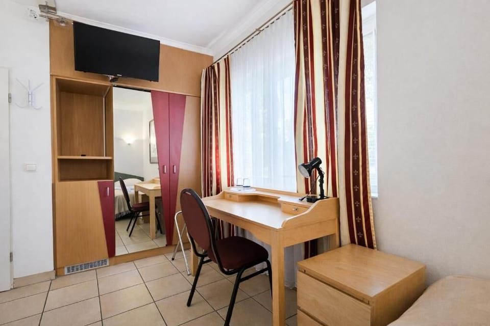 Desk, WiFi (free), bed sheets