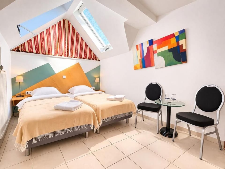 Desk, WiFi (free), bed sheets