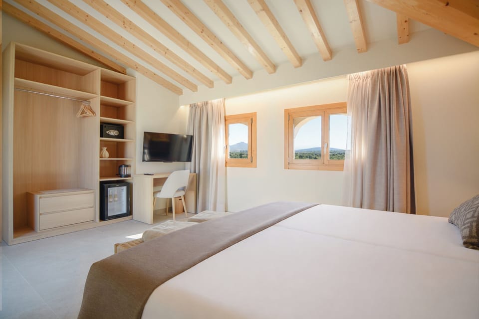 Superior Suite, Mountain View | Premium bedding, down comforters, minibar, in-room safe