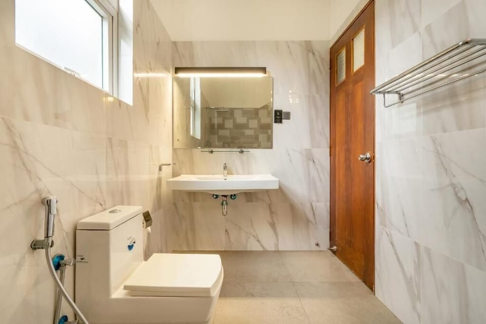 Double Room, Balcony, City View (1) | Bathroom | Shower, rainfall showerhead, free toiletries, hair dryer