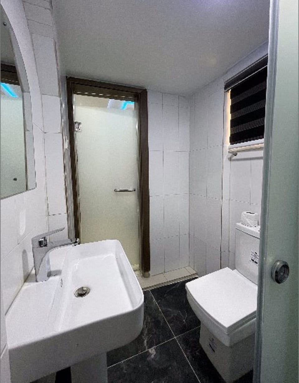 Standard Room | Bathroom | Shower, rainfall showerhead, designer toiletries, bathrobes