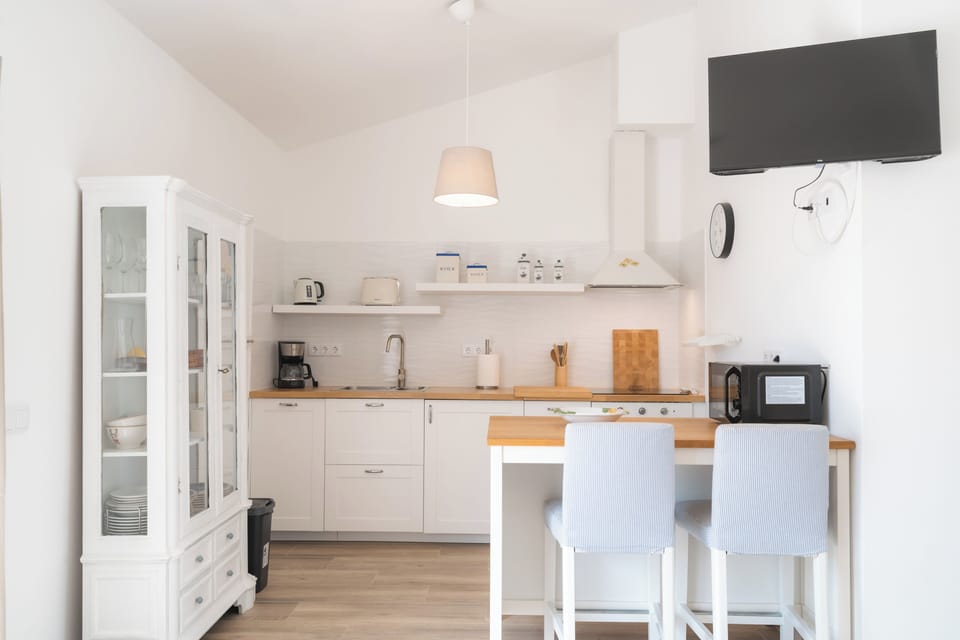 Deluxe Villa, Ocean View | Private kitchenette | Coffee/tea maker, full-size fridge, microwave, oven