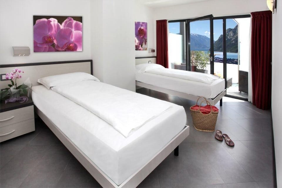 Twin Room, Lake View | In-room safe, blackout drapes, cribs (surcharge), WiFi (free)
