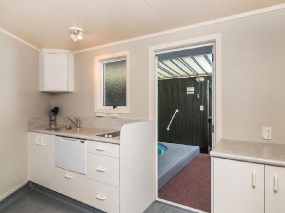 Studio with Spa | Private kitchenette | Full-size fridge, microwave, stovetop, dishwasher