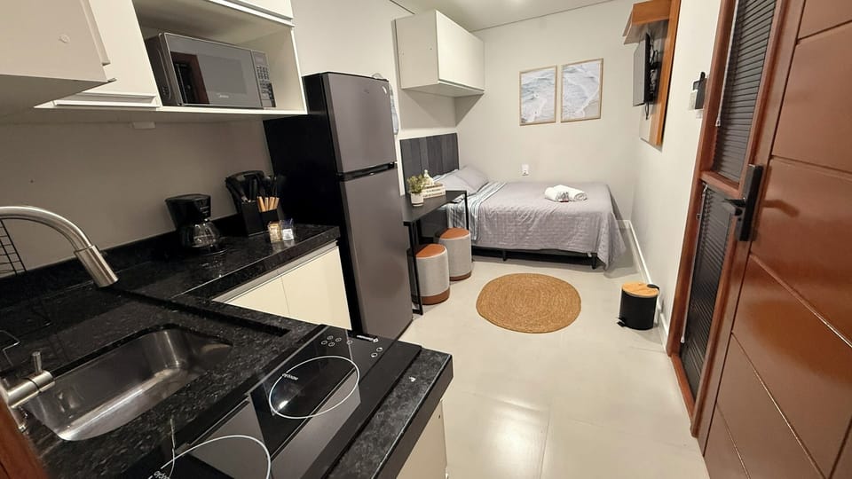 Fridge, microwave, stovetop, cookware/dishes/utensils