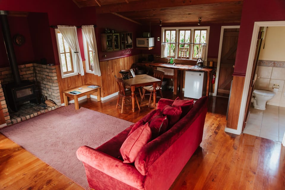 Romantic Cottage | Living area | 32-inch LCD TV with digital channels, TV, fireplace