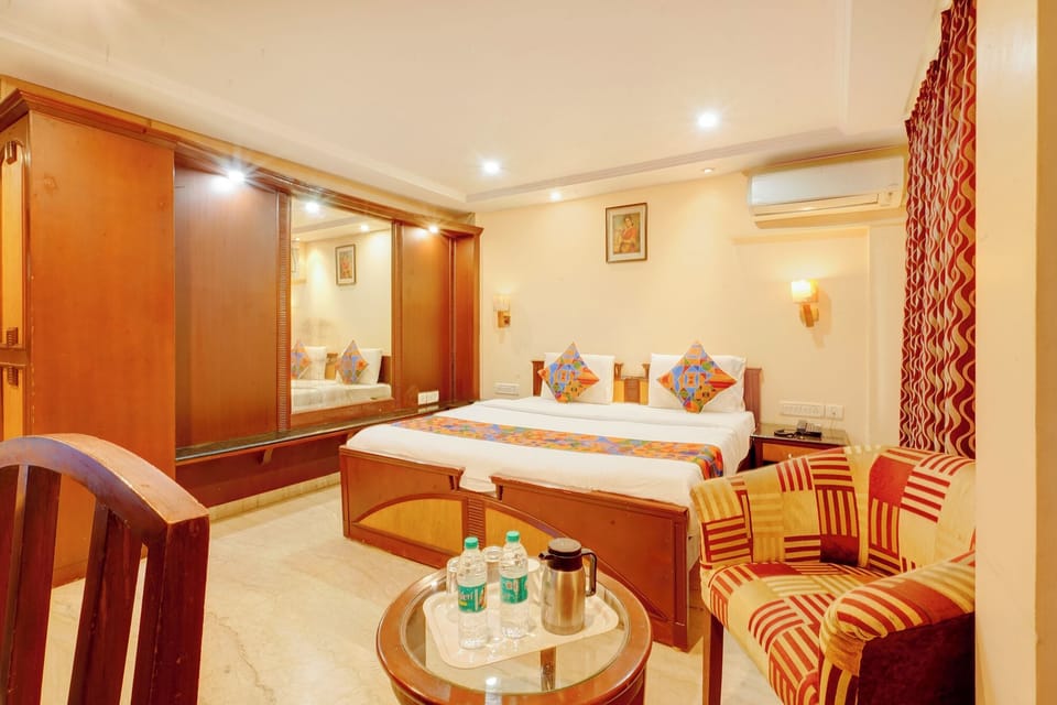 Deluxe Room | Egyptian cotton sheets, premium bedding, in-room safe, desk