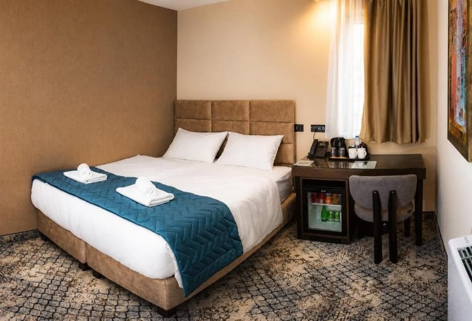 Standard Single Room, City View | In-room safe, desk, blackout drapes, soundproofing