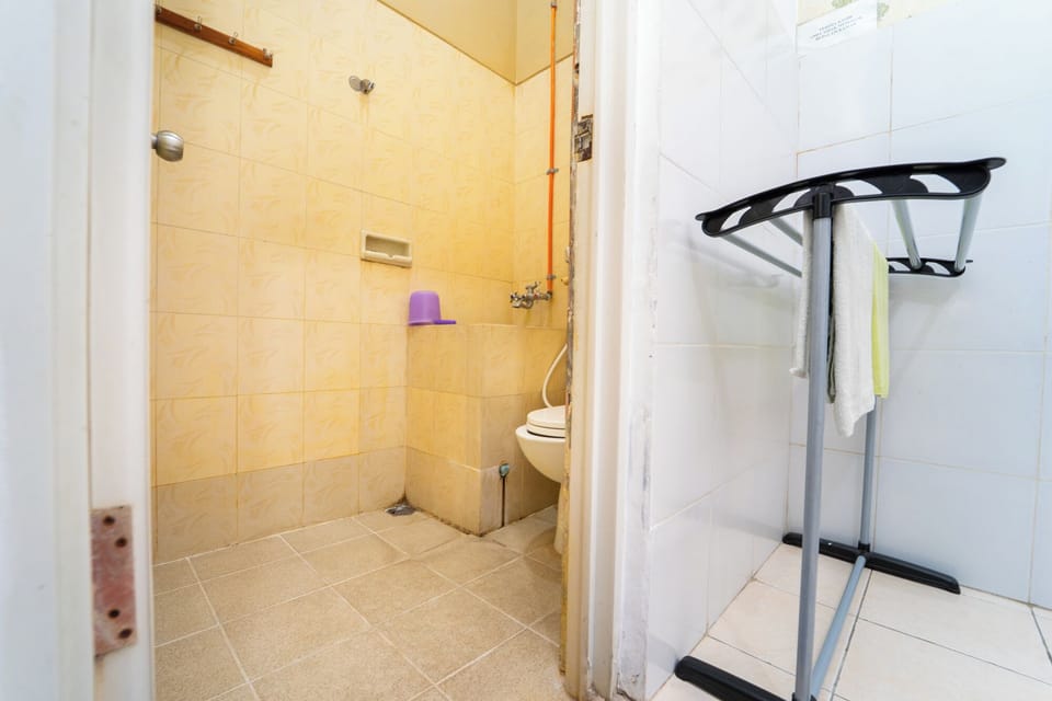 Deluxe Room | Bathroom | Shower, towels