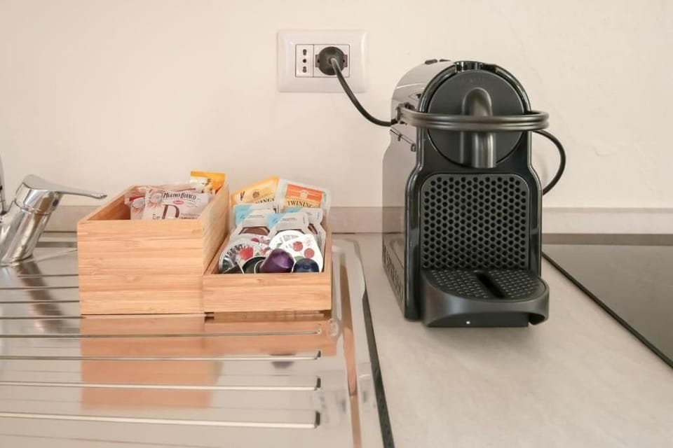 Apartment, Balcony, City View | Coffee and/or coffee maker