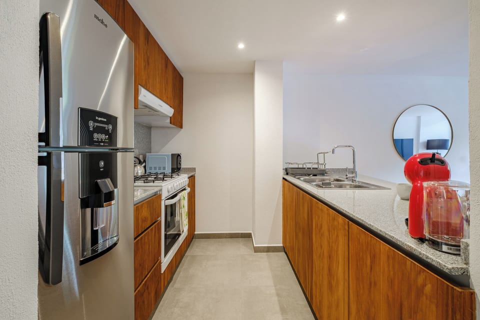 Classic Apartment, Balcony, City View | Private kitchen | Coffee/tea maker, full-size fridge, microwave, stovetop