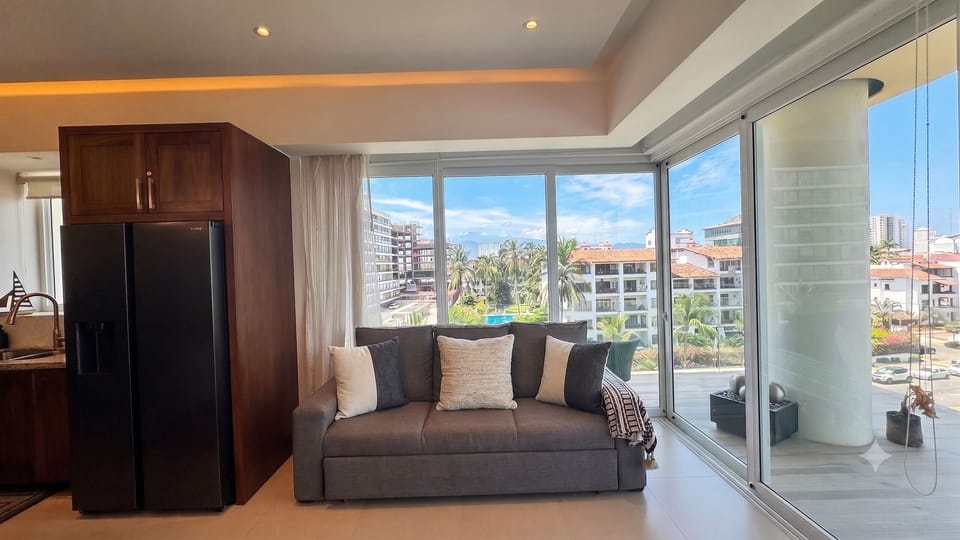 Superior Apartment | Living area | 60-inch LCD TV with cable channels