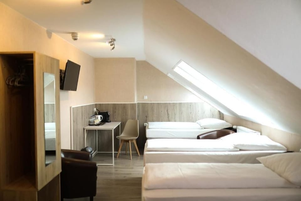 Quadruple Room, City View | Desk, free WiFi