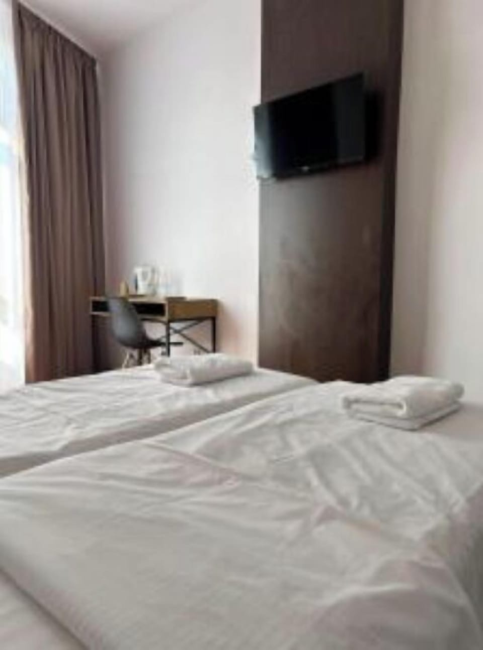 Iron/ironing board (on request), WiFi (free)