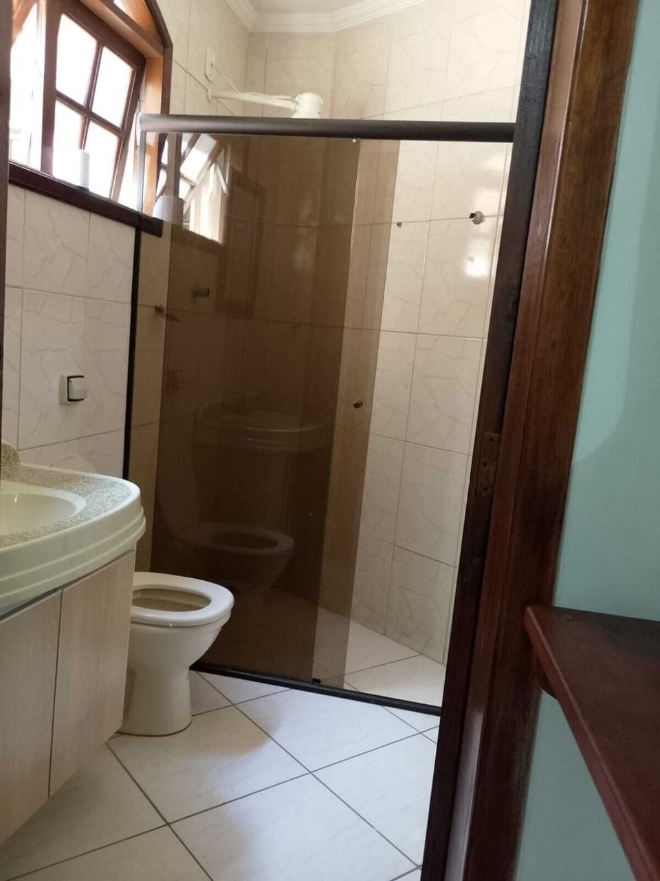 Shower, hair dryer (on request), towels, soap