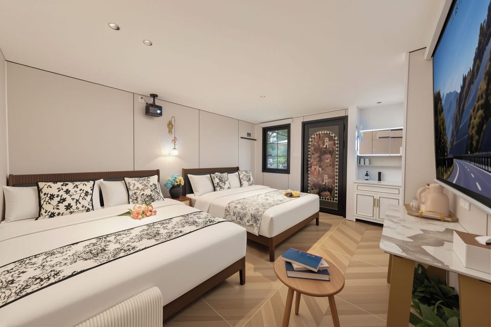 Basic Quadruple Room, Courtyard View | Down comforters, laptop workspace, blackout drapes