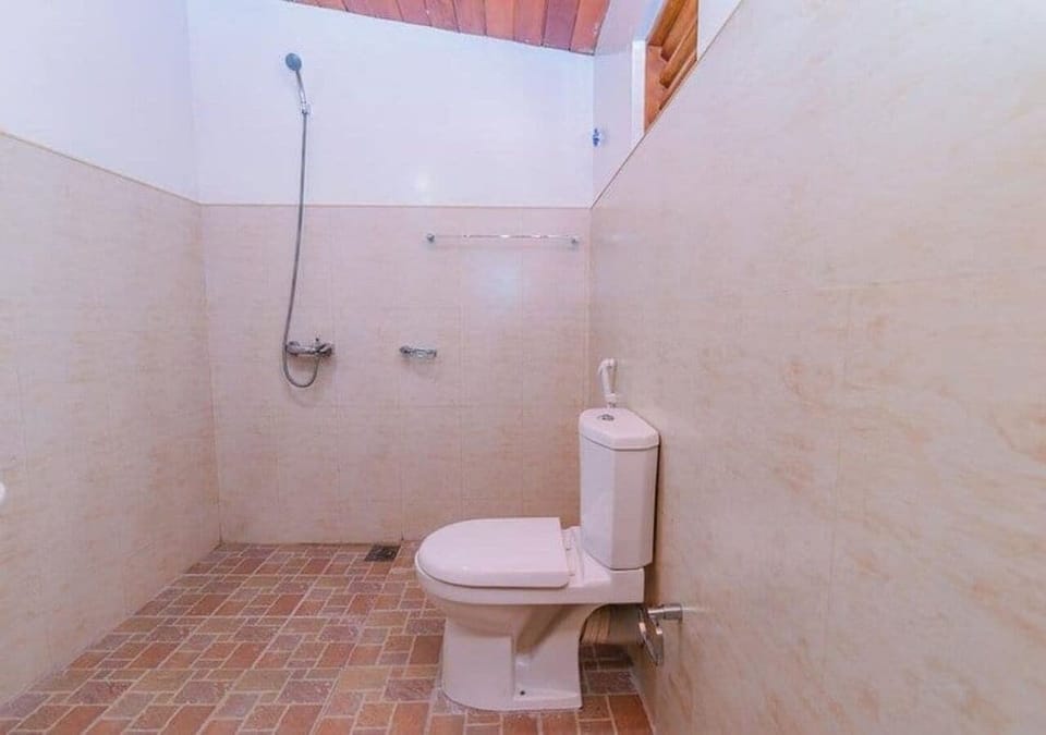 Family Quadruple Room | Bathroom | Shower, towels, soap, toilet paper