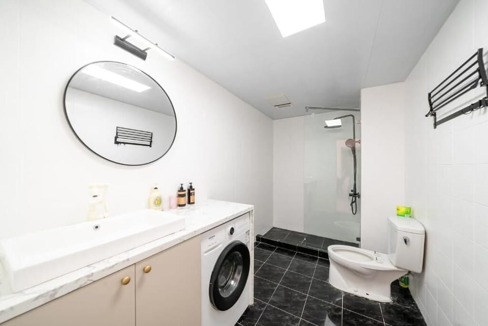 Family Apartment, Balcony, City View | Bathroom | Slippers