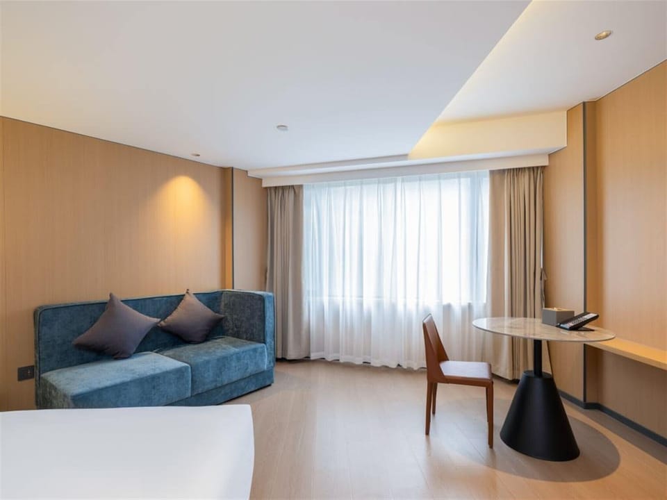 Comfort Room | Laptop workspace, iron/ironing board, WiFi (free), bed sheets