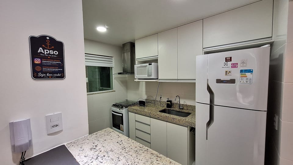 Basic Apartment | Private kitchen | Electric kettle, dining table