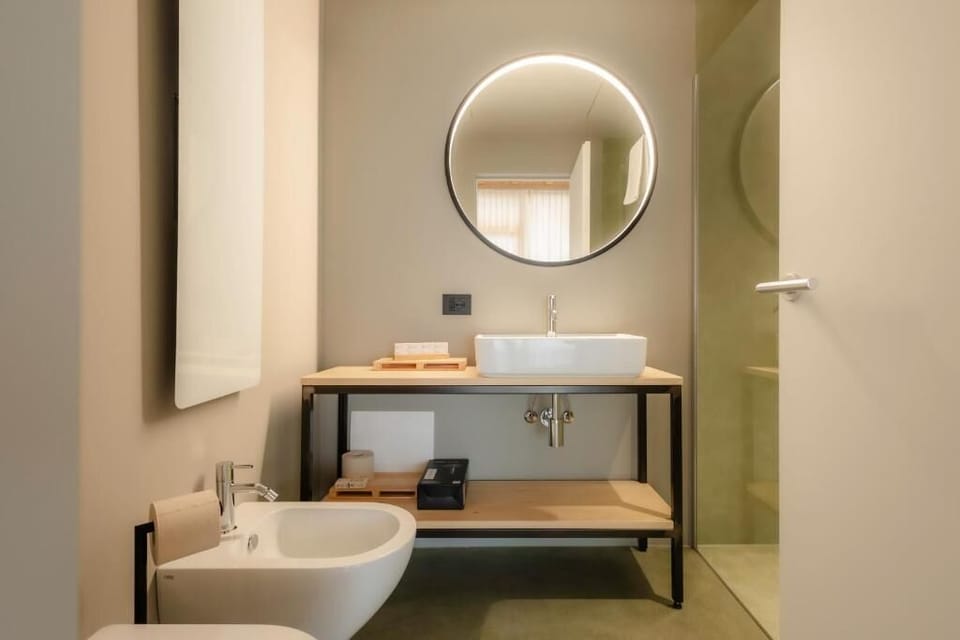 Shower, eco-friendly toiletries, hair dryer, slippers