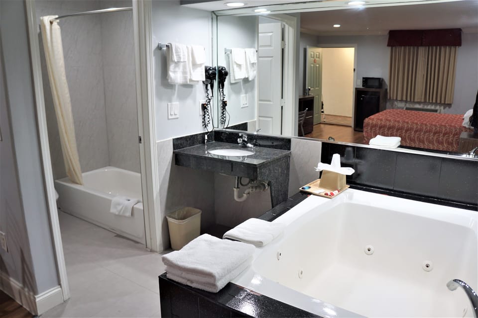 Standard Room, 1 King Bed, Jetted Tub | Deep soaking bathtub