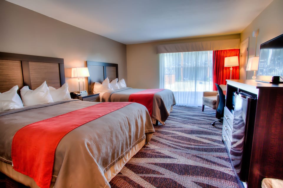 Desk, laptop workspace, blackout drapes, iron/ironing board