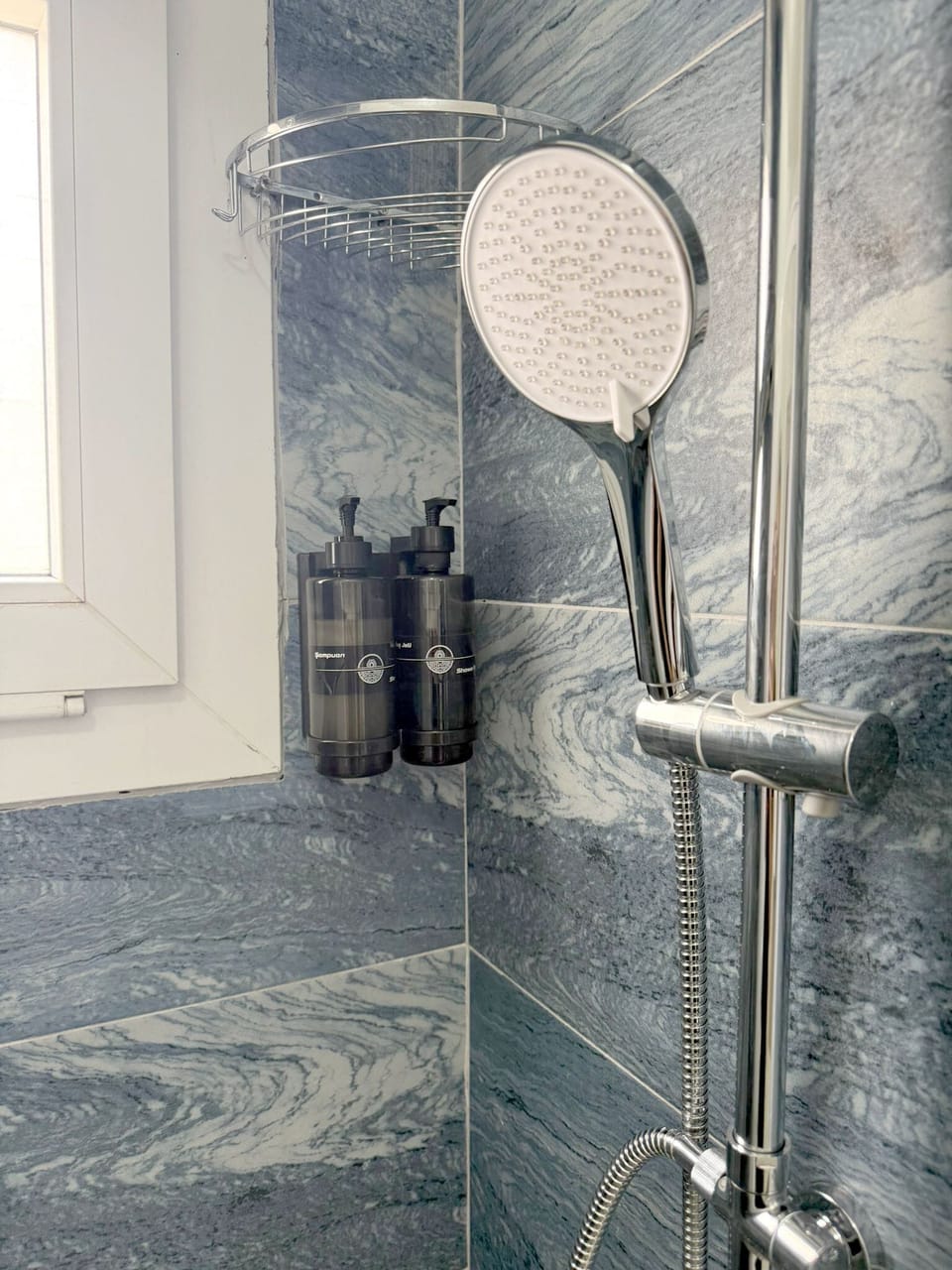 Shower, hair dryer, slippers, towels