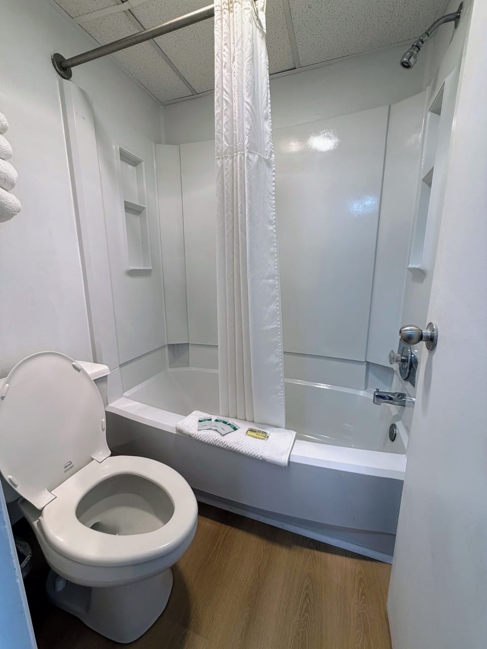 Combined shower/tub, hair dryer, towels, soap